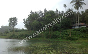 3.5acre land with small house for sale Near Karapuzha Dam